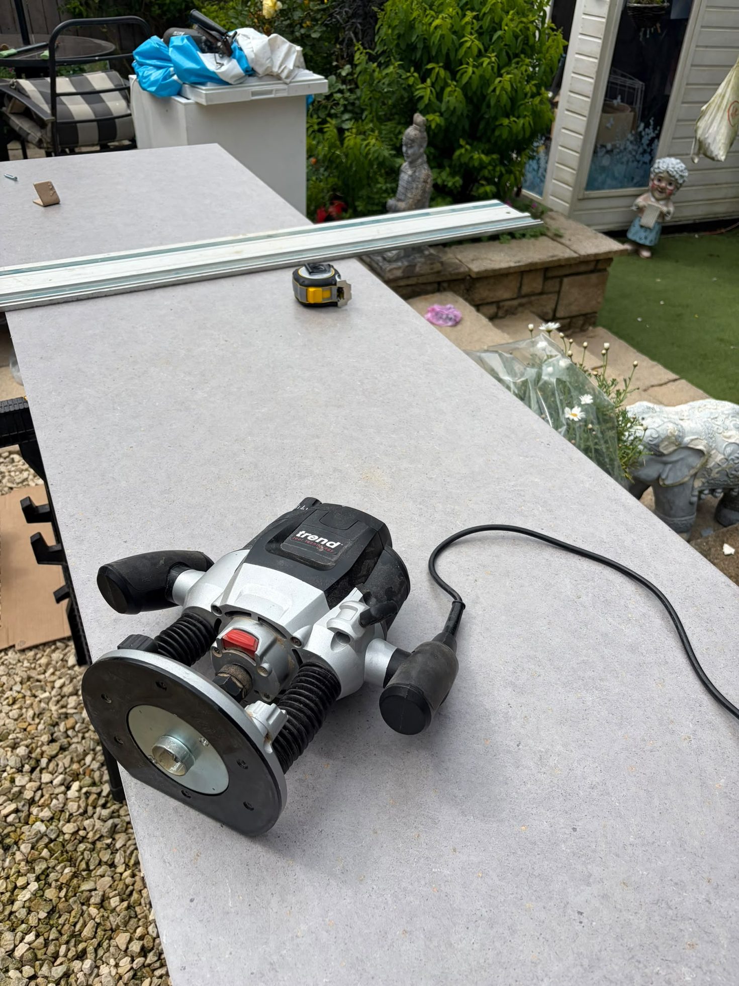 Router and rail set up on site for precision timber and worktop machining by Impact Joinery